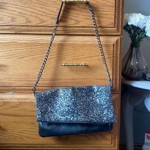 Like new express fold over shoulder bag